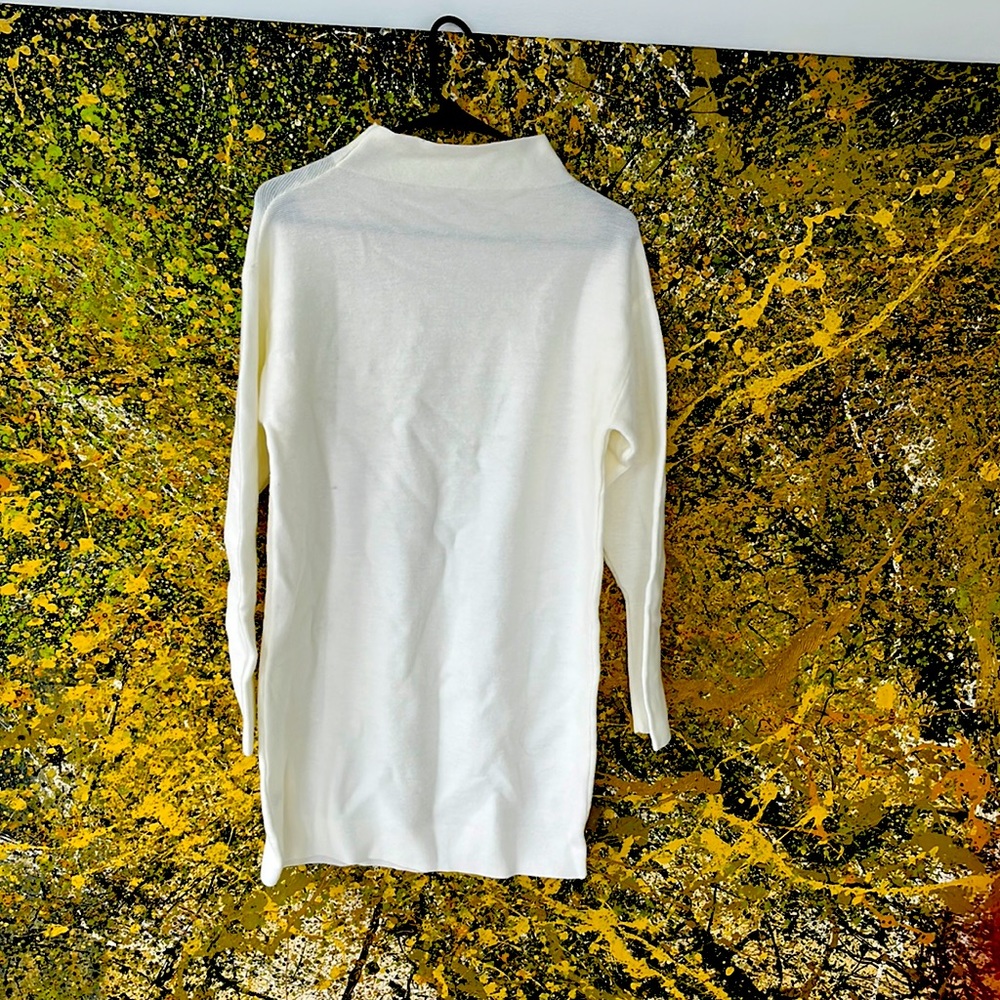 Cream sweater dress or oversized top in size medium.